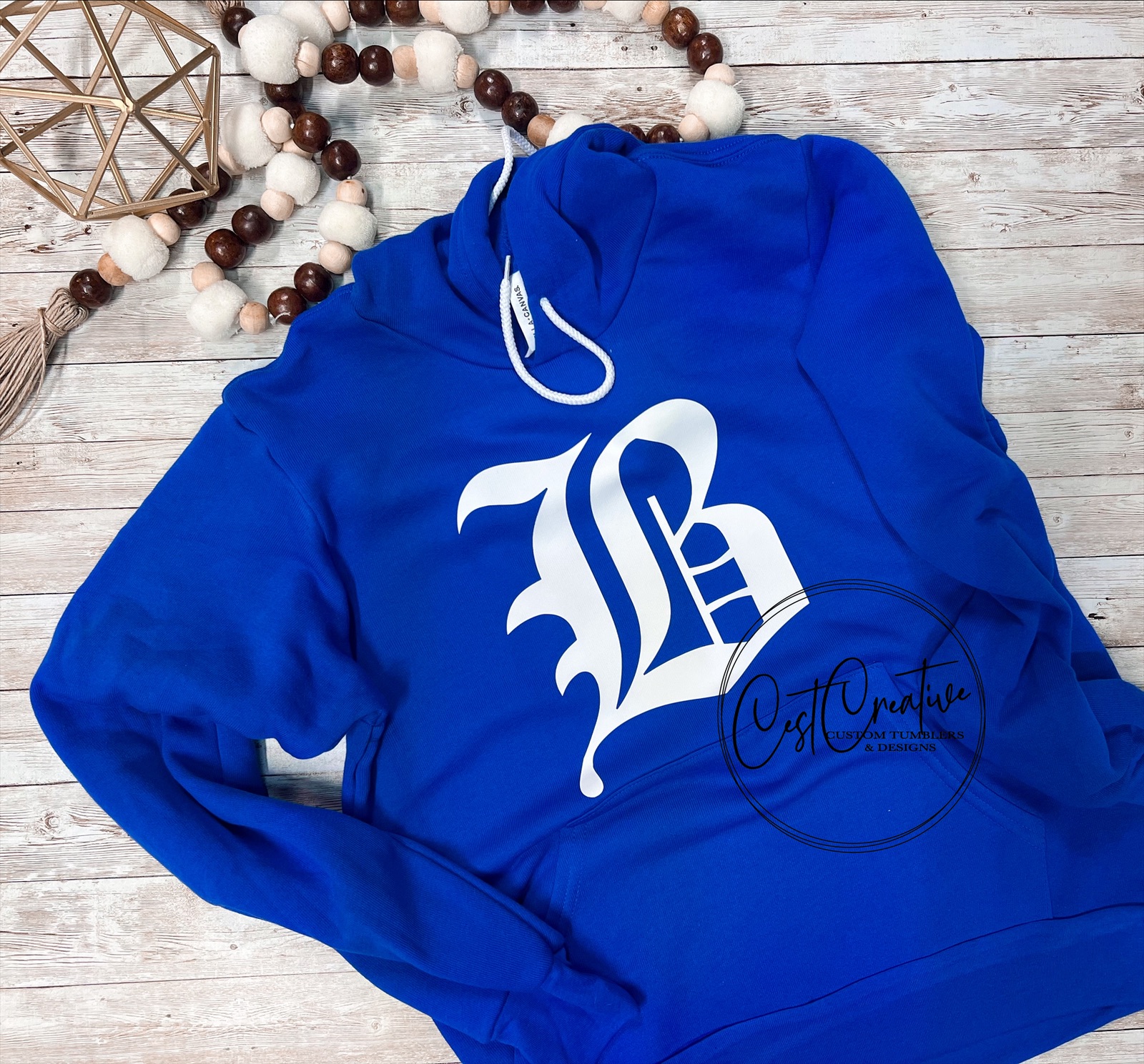 royal blue hooded sweatshirt with white B