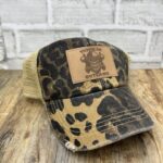 leopard hat with tumbler outlaws patch