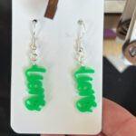 Green Lions earrings with silver hardware