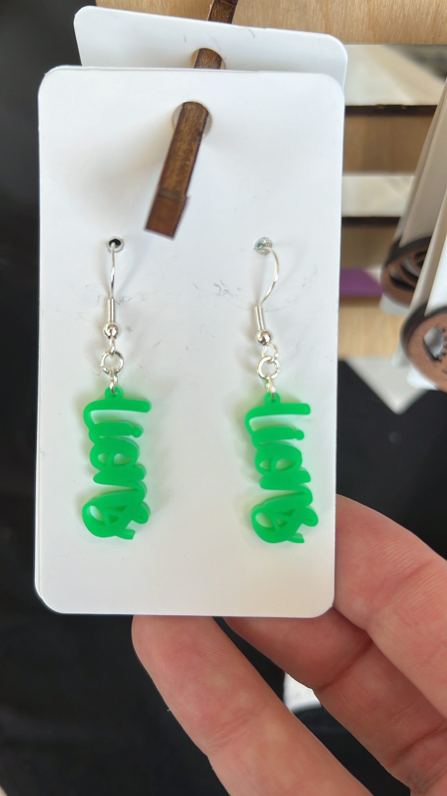 Green Lions earrings with silver hardware